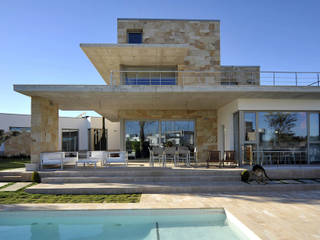 PORTICUS. Érase una vivienda a un porche pegada., Chiarri arquitectura Chiarri arquitectura Mediterrane Häuser