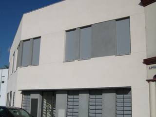 Siete Viviendas y garaje entre medianeras, Arquibox Arquibox Maisons minimalistes