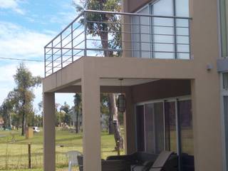 Casa en Barrio Cerrado, Grupo PZ Grupo PZ Modern balcony, veranda & terrace