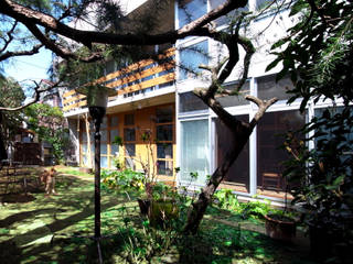 庭と一つになる家 The house which becomes united with a garden, ユミラ建築設計室 ユミラ建築設計室 Moderner Garten