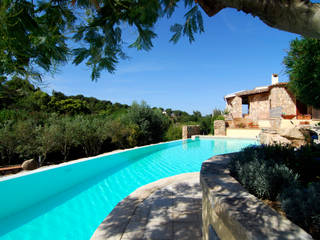 CASA W - COSTA SMERALDA, ARANXIU OFFICINA DI ARCHITETTURA ARANXIU OFFICINA DI ARCHITETTURA Piscina in stile mediterraneo