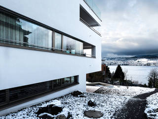 Mehrfamilienhaus 'Flair' in Herrliberg, AMZ Architekten AG sia fsai AMZ Architekten AG sia fsai Casas multifamiliares