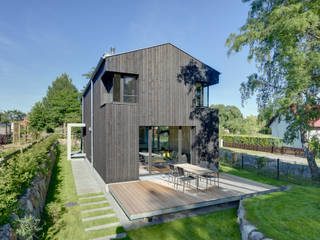 Modernes Ferienwohnhaus in Anlehnung an ein traditionelles Drempelhaus, Möhring Architekten Möhring Architekten Tetto a falde