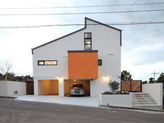 풍광좋은 제주 개러지 하우스, 주택설계전문 디자인그룹 홈스타일토토 주택설계전문 디자인그룹 홈스타일토토 Modern garage/shed Orange