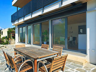 Haus Tessin, Holzhaus-Rosskopf Holzhaus-Rosskopf Klassischer Balkon, Veranda & Terrasse