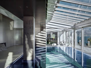Villa T: Una Splendida proprietà allungata su una riva del lago di Como, arkham project arkham project Modern pool