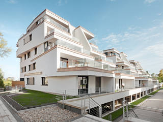 Neubau Terrassenwohnen Elbbahnhof, arc architekturconzept GmbH arc architekturconzept GmbH Case in stile minimalista