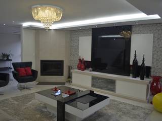 Sala estar com lareira, Ésse Arquitetura e Interiores Ésse Arquitetura e Interiores Modern Living Room