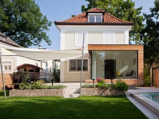 Umbau und Anbau für ein Haus in Salzburg, aichberger architektur ZT aichberger architektur ZT Nhà phong cách kinh điển Gỗ Wood effect