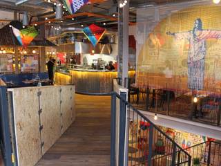 Cabana Brasilian Barbecue Restuarant : rustic  by BluBambu Living , Rustic   