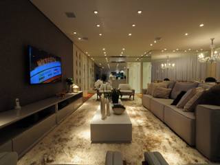 Iluminação destaca elegante projeto de apartamento no litoral paulista, Guido Iluminação e Design Guido Iluminação e Design Classic style living room