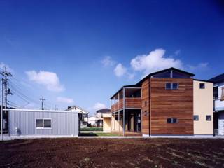 ガレージのある家, 池野健建築設計室 池野健建築設計室 Casas modernas Madeira Acabamento em madeira