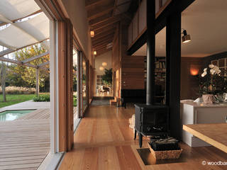 Casa in legno nella campagna veneta, Woodbau Srl Woodbau Srl Living room Wood Wood effect