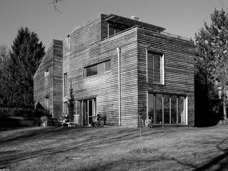 Haus Hipp, Fürst & Niedermaier, Architekten Fürst & Niedermaier, Architekten Jardines de estilo moderno Madera Acabado en madera