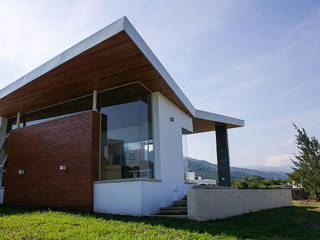 Desafiando paradigmas - Casa H Los Azhares, CB Design CB Design Moderne Häuser Ziegel