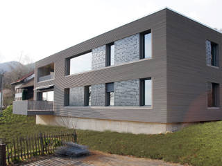 MFH Hägendorf, A+P Architektur und Planung GmbH A+P Architektur und Planung GmbH Nowoczesne domy Drewno O efekcie drewna