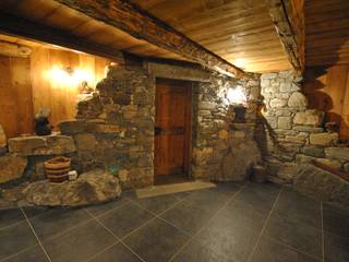 Taverna di montagna, Sangineto s.r.l Sangineto s.r.l Rustic style living room Stone