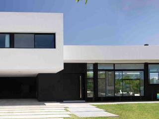 Casa Grand Bell, Remy Arquitectos Remy Arquitectos منازل