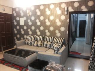 Ajnara Residential Apartment., Decor At Door Decor At Door Tropical style living room