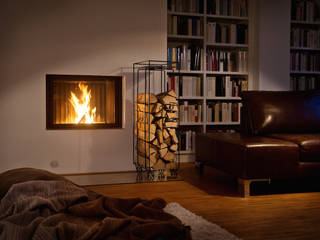 homify Salas modernas Chimeneas y accesorios