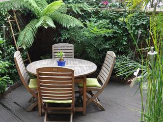 Terrasse exotique en ville, Taffin Taffin Tropical style garden