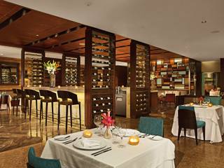 Secrets the vine. Cancún, Marbol industria Mueblera Marbol industria Mueblera Classic style dining room