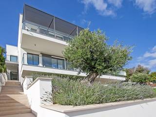 VIVIENDA, ABAD Y COTONER, S.L. ABAD Y COTONER, S.L. Minimalistische Häuser
