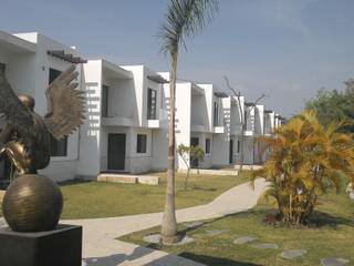 Bosques de Jiutepec, DYE-ARQUITECTURA DYE-ARQUITECTURA Casas unifamiliares Caliza