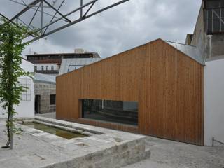 Casa da Memória em Guimarães, Miguel Guedes arquitetos Miguel Guedes arquitetos Minimalistische Häuser Holz Holznachbildung