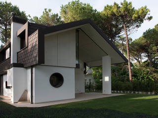 Villa di vacanze al mare, Studio di architettura Talamini e Camerin Studio di architettura Talamini e Camerin Giardino moderno