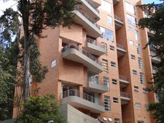 Edificio Terrazas de Medina, Vertice Oficina de Arquitectura Vertice Oficina de Arquitectura Casas modernas Tijolo