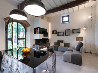 Lo scrigno dal cuore contemporaneo, B+P architetti B+P architetti Moderne Wohnzimmer