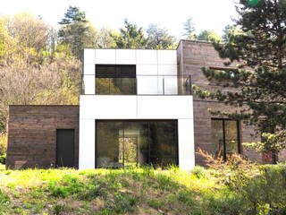 Parcel house, archizip archizip Casas de estilo moderno Madera Acabado en madera