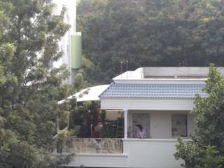 Mr.Sudharshan Reddy's residence, Fabritech India Fabritech India Varandas, marquises e terraços modernos