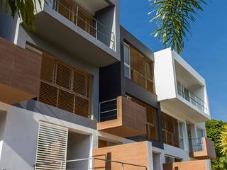 RESIDENCIAS PARQUE VIRGINIA: casas entre luces, NMD NOMADAS NMD NOMADAS บ้านและที่อยู่อาศัย