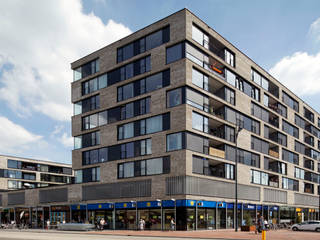 appartementen en commerciële voorzieningen, JMW architecten JMW architecten Modern houses Bricks