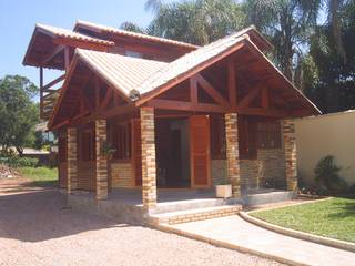 Casa Legno, Graziela Alessio Arquitetura Graziela Alessio Arquitetura Country style house Solid Wood Multicolored