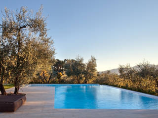 MIDE architetti Rustic style pool
