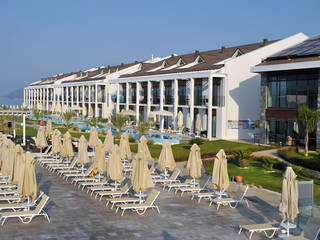 JIVA BEACH RESORT FETHİYE, ROMANO DİZAYN ROMANO DİZAYN Jardim interior