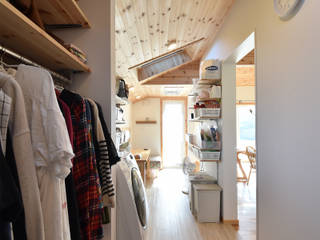 施主様と一緒に設計した多目的な家事室, 木の家株式会社 木の家株式会社 Eclectic style media room