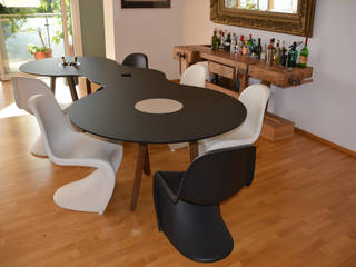 Zentralidee, herpich & rudorf GmbH + Co. KG herpich & rudorf GmbH + Co. KG Modern dining room Wood Black Tables