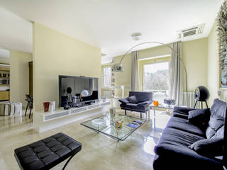 Ristrutturazione di un'abitazione privata, 2011-2012., Officina29_ARCHITETTI Officina29_ARCHITETTI Modern living room
