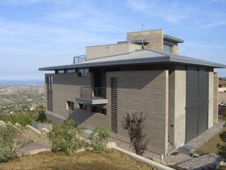 Abitazione e ufficio a Borgo Maggiore (RSM), STUDIO GRASSI STUDIO GRASSI Modern houses
