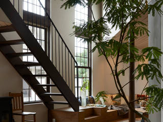 House in Nishitomigaoka, Mimasis Design／ミメイシス デザイン Mimasis Design／ミメイシス デザイン غرفة المعيشة خشب Wood effect