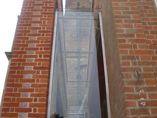 Structural glass linkways in heritage buildings, Ion Glass Ion Glass Paredes y pisos de estilo moderno Vidrio