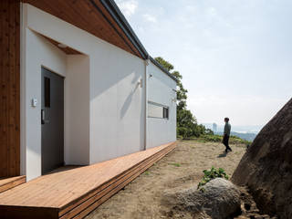 바위집( ROCK HOUSE ), B.U.S Architecture B.U.S Architecture Case moderne