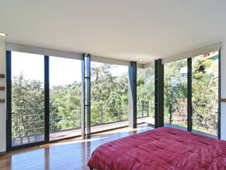 Casa La Lagartija, alexandro velázquez alexandro velázquez Moderne slaapkamers
