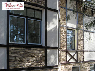 Fachwerk-Hausfassade mit Steinverkleidung, White Hills Stones GmbH White Hills Stones GmbH Rustikale Häuser Stein Braun
