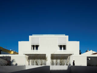 Moradias Manta Rota, Posto9 Arquitectos Posto9 Arquitectos Modern houses