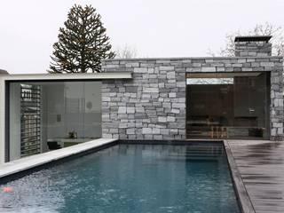 Poolhouse in graniet, Arend Groenewegen Architect BNA Arend Groenewegen Architect BNA Moderne Pools Granit Grau